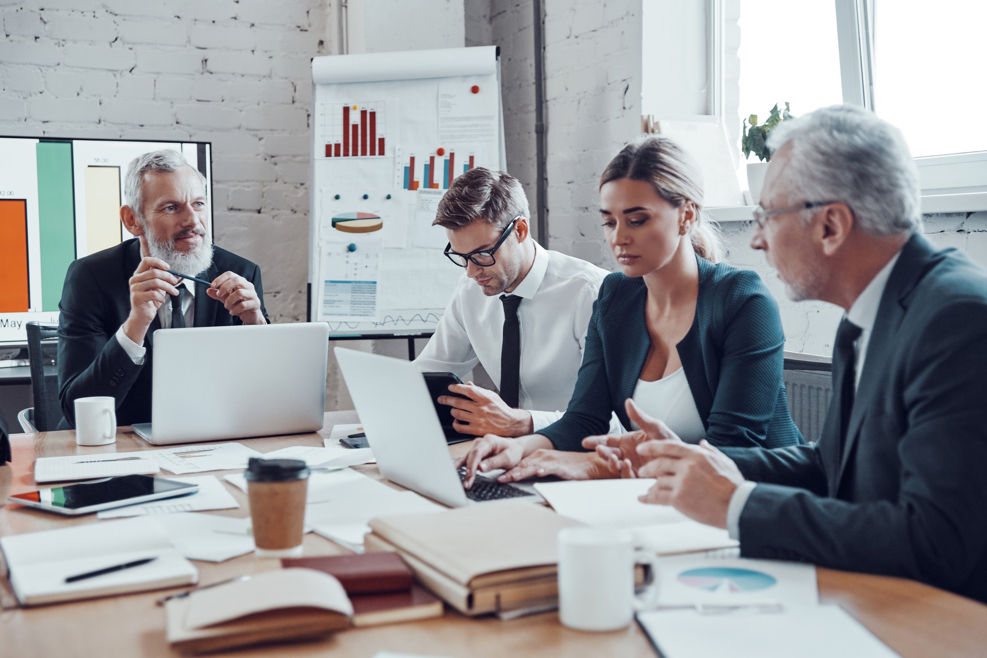 Family law specialist discussing divorce proceedings with clients in modern office